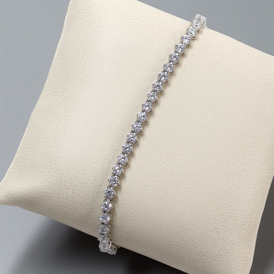 Front view of adjustable CZ tennis bracelet with platinum-plated finish