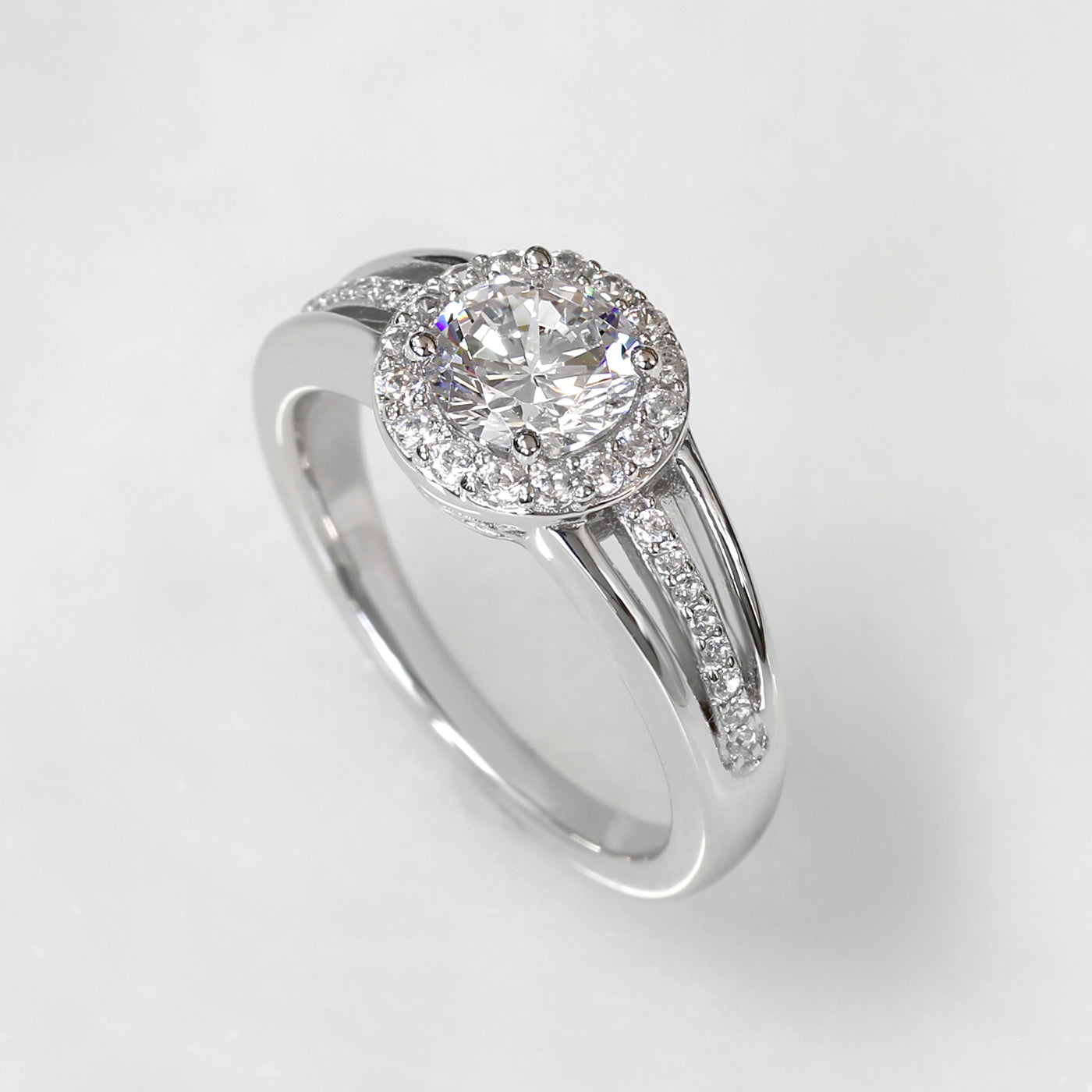 Platinum Plated Sterling Silver Diamond Simulant 3-Row Halo Ring