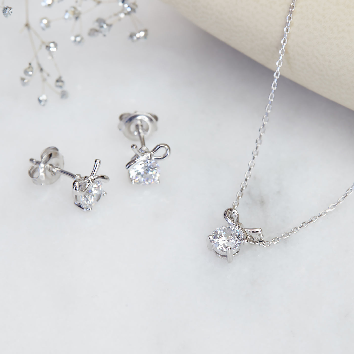 Sterling Silver Diamond Simulant Bow Pendant Necklace and Earring Set