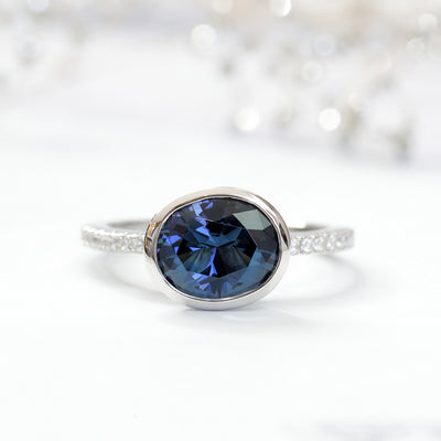 Platinum Plated Sterling Silver Simulated Blue Sapphire East West Ring