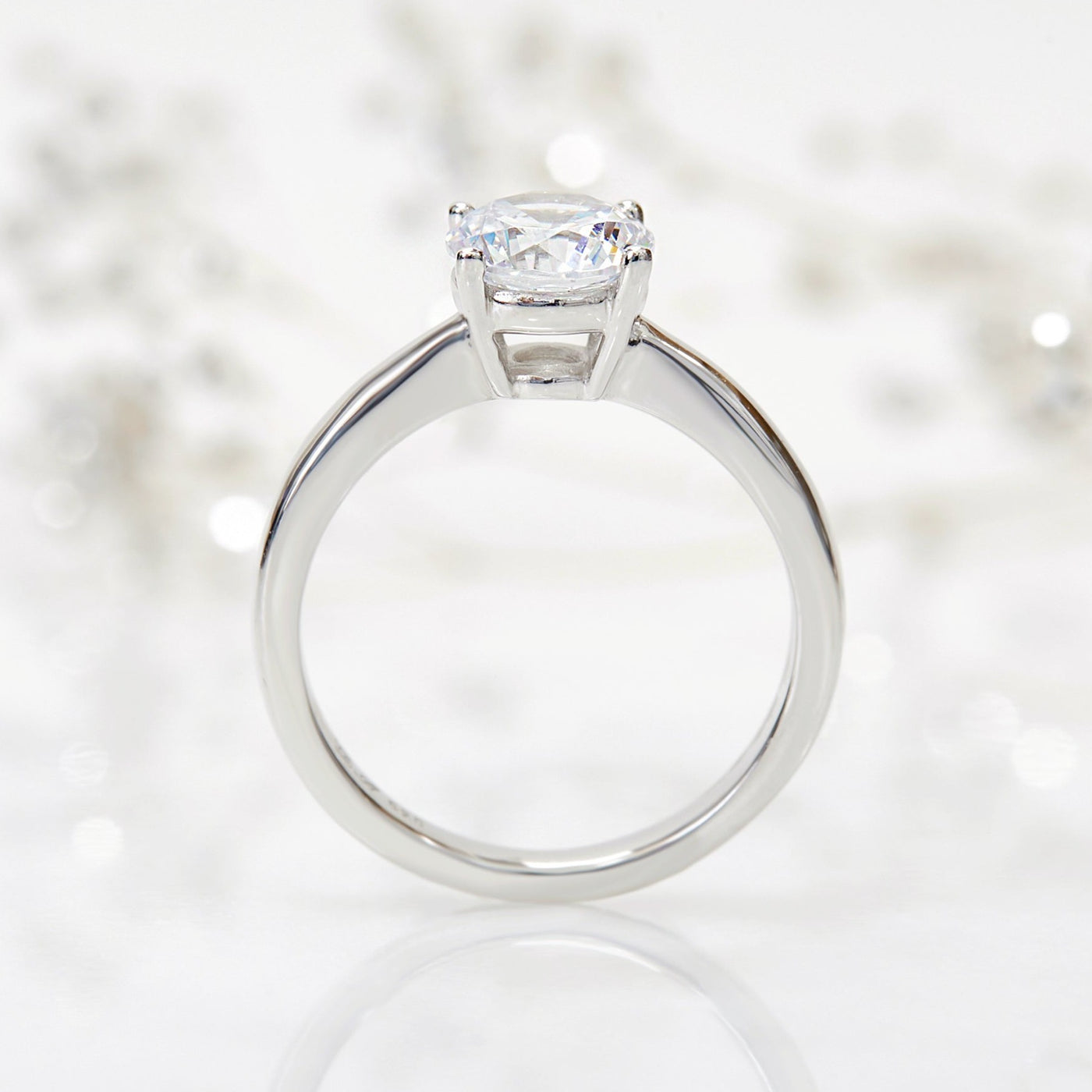 Lustrous Tapered Solitaire Ring. 1.2 CT